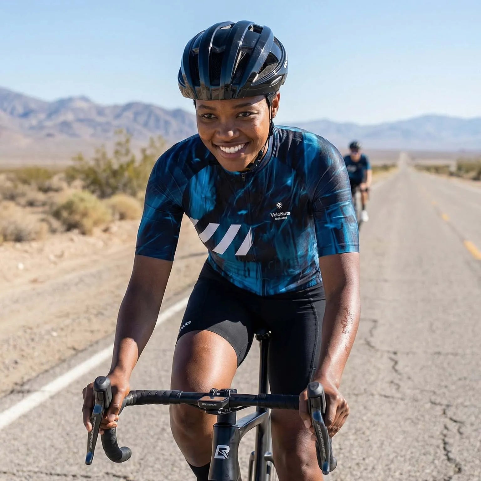 **文件名：** velonuts-cycling-jersey-ink-burst-mens-womens.jpg  **Alt 标签：** VeloNuts Ink Burst cycling jersey for men and women designed for breathable comfort and performance road cycling