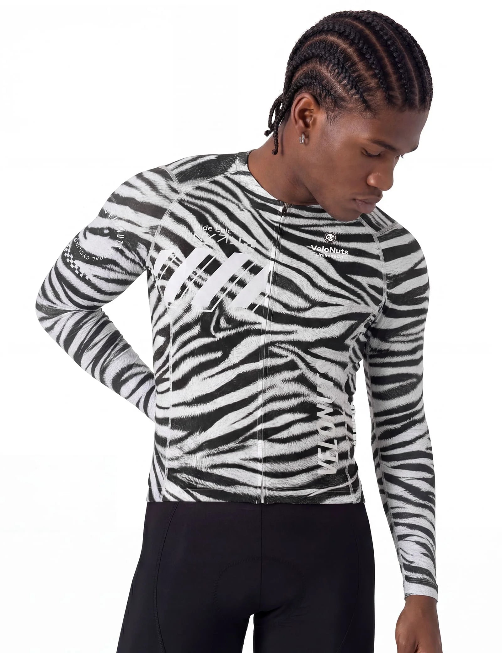 VeloNuts Men’s black and white cycling jersey with a zebra-inspired print, breathable side panels, silicone hem gripper, and three rear pockets.