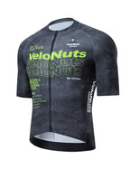Men's black and fluorescent green short sleeve cycling jersey with python-inspired pattern and breathable mesh back.