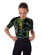 VeloNuts Women’s short sleeve cycling jersey with a tire-track print, breathable side panels and three rear pockets.